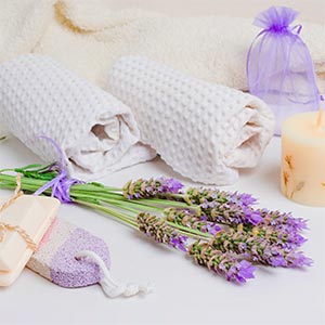 lavender blossoms, soap, spa towels